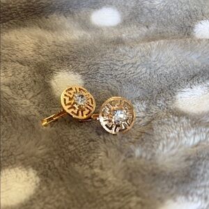 Intricate Gold and Silver Earrings with Filigree Design